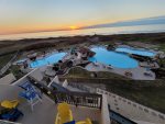 Balcony view of 2 pools  2-1/2 foot with waterfalls to the 3-foot pool. Open view to the Gulf  Make Coastal Calm, Port Aransas, your family vacation destination.